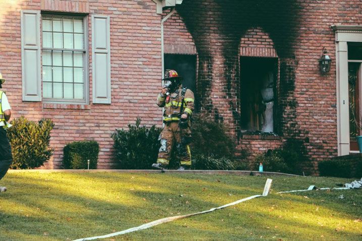 Firefighters battling a house fire 